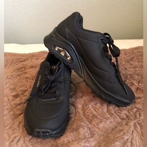 Sketchers black workshoes women 7
